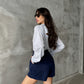 Shorts elegantes de algodón azul marino con cintura elástica trasera; perfectos para looks formales o casuales según la ocasión